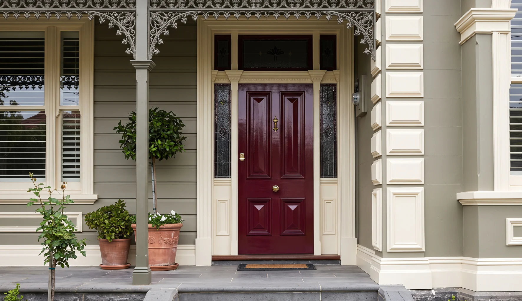 Wall moulding trim framing a front door entrance on a Melbourne home with contrasting paint finish