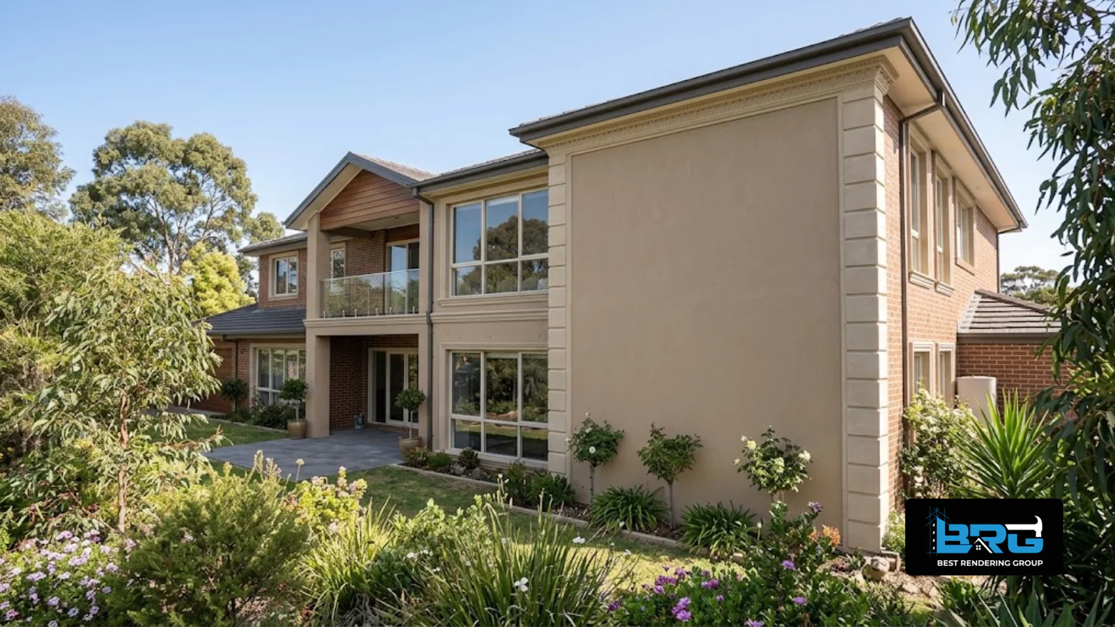 A large, leafy-block family home in Rowville, Melbourne, showing a completed feature render wall alongside detailed architectural moulding trim, established garden.