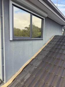 New flashing tape along the roof and wall junction before rendering, Endeavour Hills