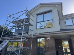 Scaffolding set up for crack repair and rendering on a two-storey Endeavour Hills home