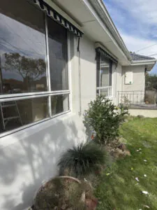 Rendered front window and landscaped garden bed at a Keysborough home.